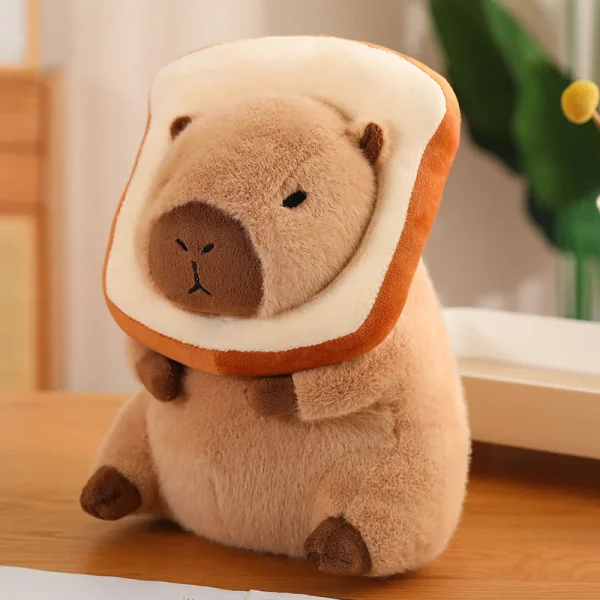 Capybara plush wearing a slice of bread around its head