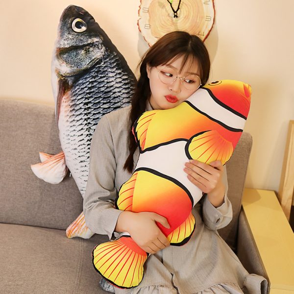 Hugging the giant clownfish pillow