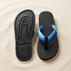 The flip-flops on sand with their surprise print
