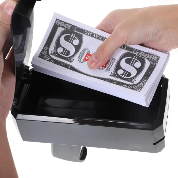 Money gun firing prop banknotes