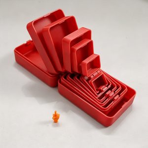 Red nested prank gift boxes, each smaller than the last