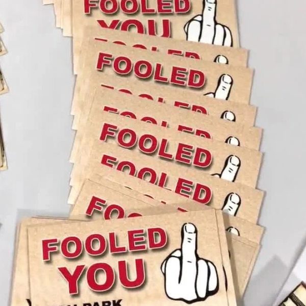 A stack of parking prank cards