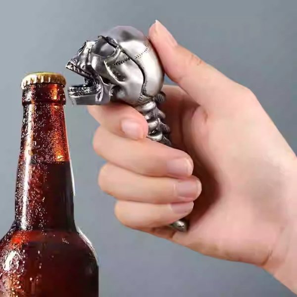 Opening a beer with the skull opener