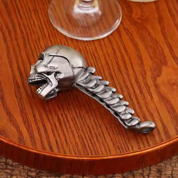 Skull bottle opener on a wooden tray