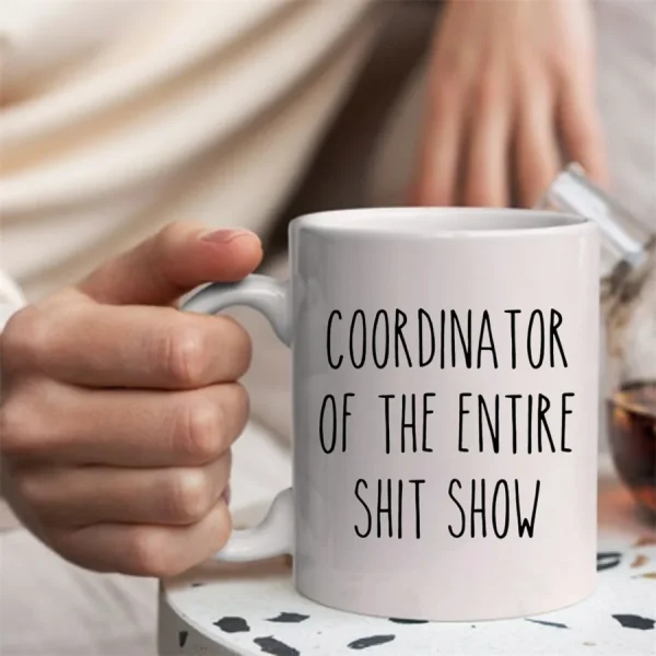 White mug printed Coordinator of the entire shit show