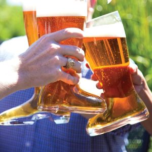 Toasting with 1 litre beer boot glasses
