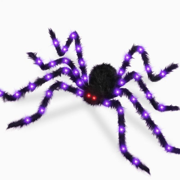 Giant furry spider with glowing red eyes on a web