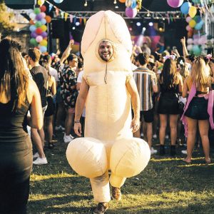Inflatable adult joke costume at a party