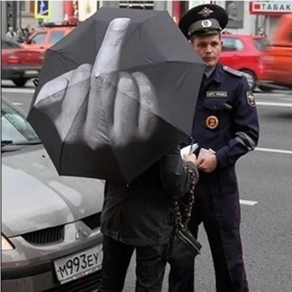 Black folding umbrella printed with a middle finger