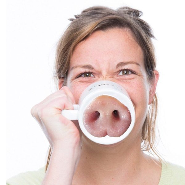 Ceramic mug with a pig nose printed inside the base