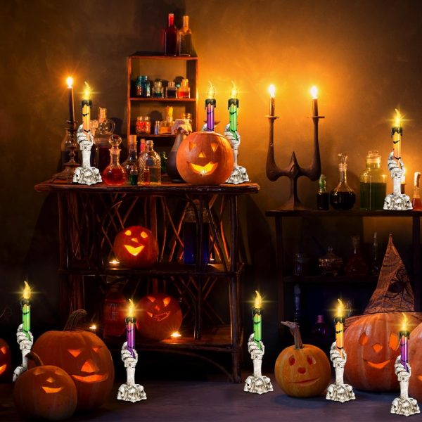 Skeleton hand candle holders with dripping candles